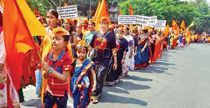 Members of the Maratha community during a silent protest march in Thane on Sunday. Pics/Atul Kamble
