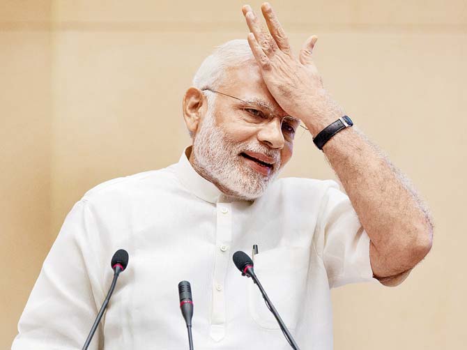 PM Narendra Modi gestures during his speech at a conference in New Delhi on Friday. Pic/AP