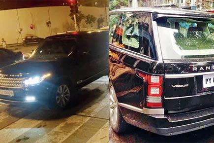 mid-day impact: DHFL chief removes number plate, tinted glass from SUV