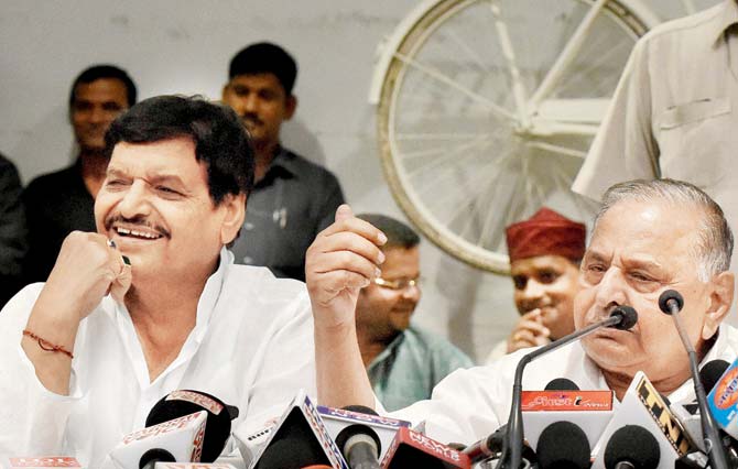 Shivpal Yadav with Mulayam Singh Yadav at the press conference where the SPâu00c2u0080u00c2u0088chief spoke