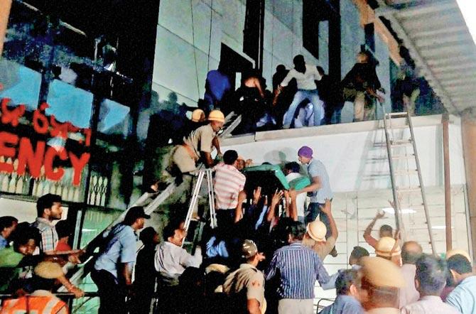 Rescue workers at the Sum Hospital. Pic/PTI