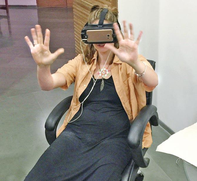 A woman watching a VR film