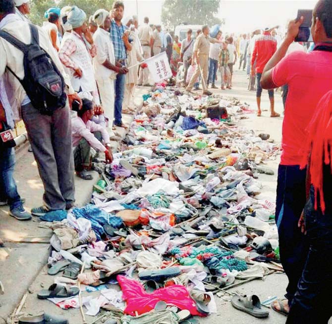 Discarded belongings at the scene after the stampede on Rajghat Bridge in Varanasi on Saturday. Pics/PTI
