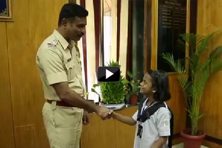 Watch Video: Little girl turns police officer, cop becomes teacher