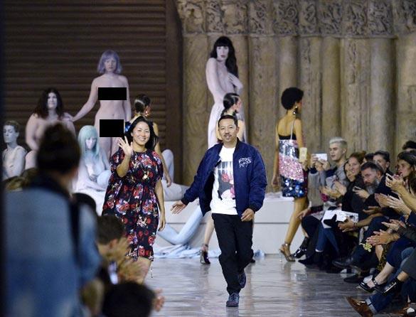 Models, who were near naked and completely nude, posed as part of an art performance for the set of the Kenzo 2017 Spring/Summer ready-to-wear collection fashion show in Paris
