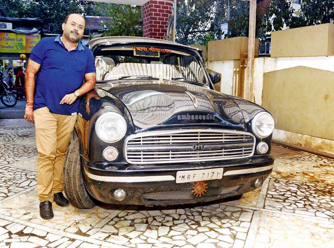 Will Borvili resident Raja Kadam have to part with his lovelingly maintained 1968 Ambassador model? PIC/SNEHA KHARABE