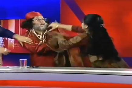 Video: 'Bigg Boss 10' contestant Swami Om slaps a woman on live TV Video of 'Bigg Boss 10' contestant Swami Omji abusing a woman on live TV goes viral