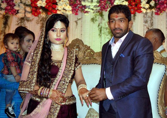 Renowned Indian wrestler Yogeshwar Dutt and Sheetal during their engagement ceremony in Sonipat. Pic/PTI