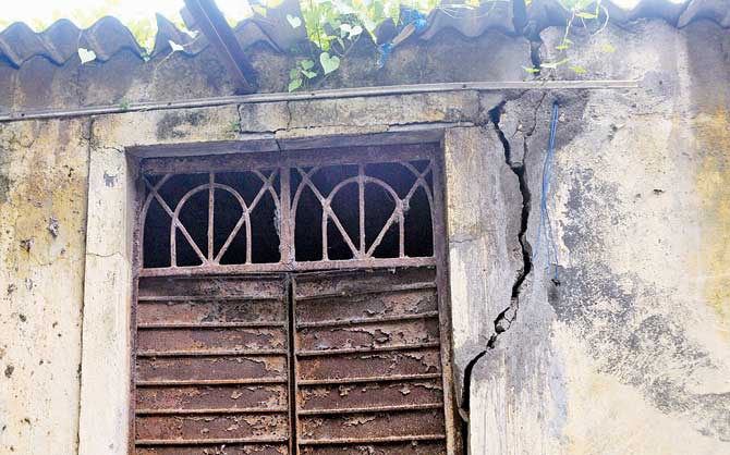 A deep crack in a wall of the building