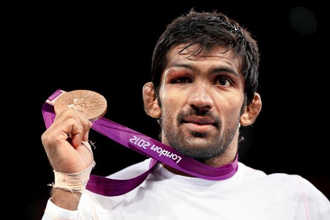 India’s Yogeshwar Dutt displays his bronze medal at the 2012 Olympic Games in London