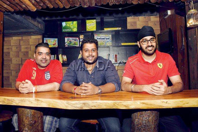 Balraj Ghai owns Hotel Uni-Continental where 3WM operates out of. The four-year-old space was set up by Meghmesh Narayn Salian (centre) who wanted to start off on his own. Sunil Thakur (right) joined in later, bringing with him Manchester United fans and official fan club membership. PIC/Pradeep Dhivar