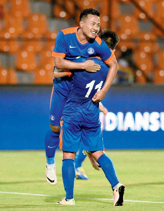 India’s Sunil Chettri (No 11) lifts teammate Jeje Lalpekhlua after the latter scored a goal against  Puerto Rico in an international friendly at the Andheri Sports Complex on Saturday. pic/pti