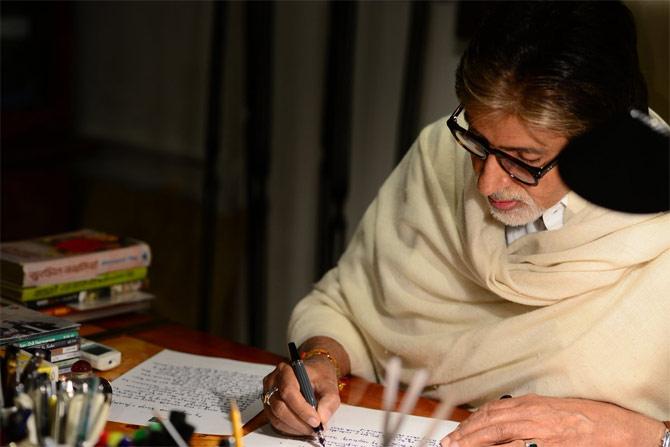 Amitabh Bachchan writing the letter to his grand daughters