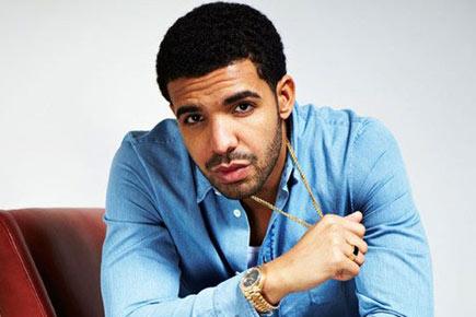Man stealing jewellery from Drake's tour bus arrested