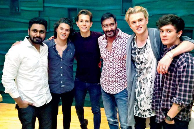 Mithoon (extreme left) with Ajay Devgn and The Vamps