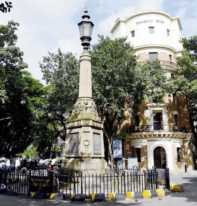 Close-ups of the winged lions and inscriptions that can be spotted at the base of the memorial, including the crest of the Bombay Port Trust. Pics/Pradeep Dhivar