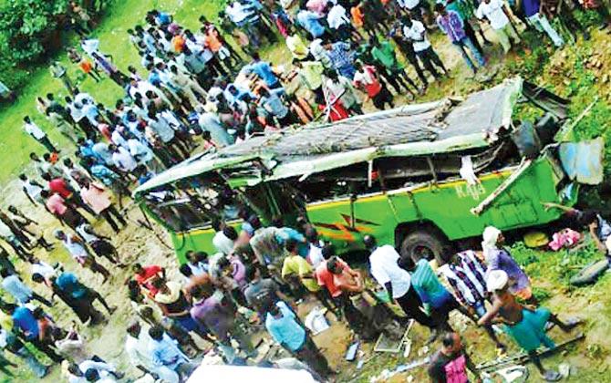 Some of the surviving passengers of the bus claimed that the driver was talking on his mobile phone when the mishap took place