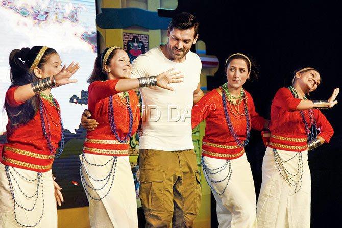 John Abraham with dancers from Arunachal Pradesh after it was announced that he was the brand ambassador of the state. PIC/PRADEEP DHIVAR 