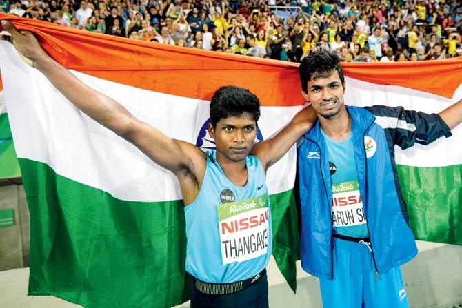 India’s Mariyappan Thangavelu (left) and Bhati Varun Singh celebrate their gold and bronze medals, respectively, in Rio on Saturday. Pic/AFP
