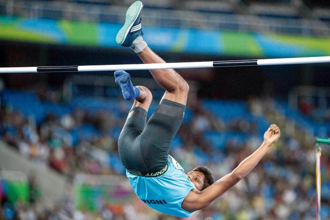 India’s Mariyappan Thangavelu jumps in the men’s T42 high jump final during the Paralympic Games at the Olympic Stadium in Rio de Janeiro on Friday. PIC/AFP 