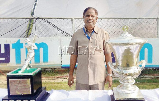 Sitaram Tambe with the trophies during the Duleep Trophy final in Greater Noida. Pic/Shalabh Manocha