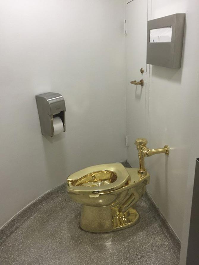 A fully functioning solid gold toilet, made by Italian artist Maurizio Cattelan, went into public use at the Guggenheim Museum in New York on Thursday