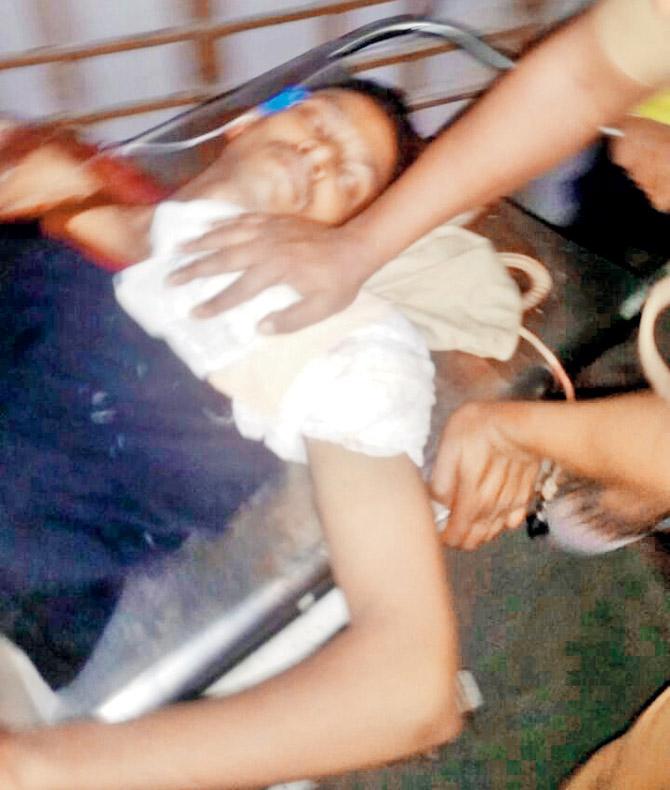 Constable Sagar Malunjkar, who tried to kill himself, being taken to Juppiter hospital in Thane