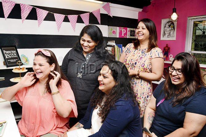 Gina-Maya Iyer (extreme left) and Priyanka Arora Nayak (extreme right), the brains behind BACON, roped in home bakers Liz Pius (second, from left), Vishaka Rautela (centre) and Mitali Lalwani after they volunteered to help make the project a reality. PIC/SNEHA KHARABE