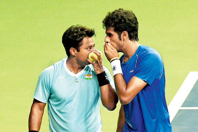 Leander Paes (left) and Saketh Myeni during India’s doubles match against Spain in the Davis Cup World Group Play off tie on Saturday 