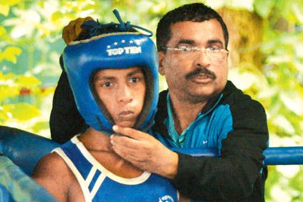 Mumbai: Kid boxer Rajesh plays the dhol to boost family funds
