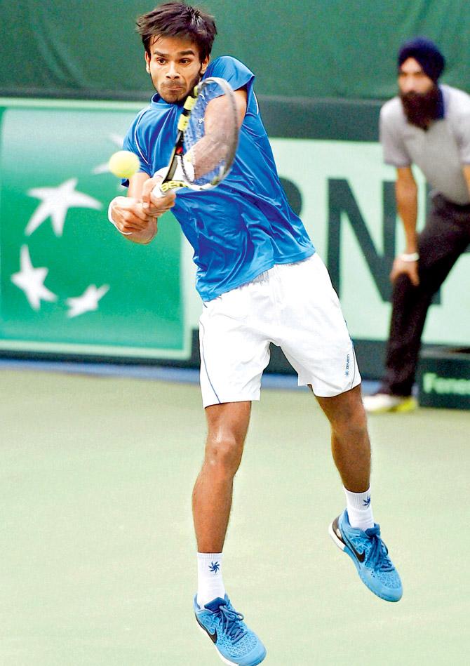 Sumit Nagal, who made his debut against Spain, very nearly pulled off a great morale-boosting win over Marc Lopez in the recently concluded Davis Cup play-off tie in New Delhi. Pic/AFP