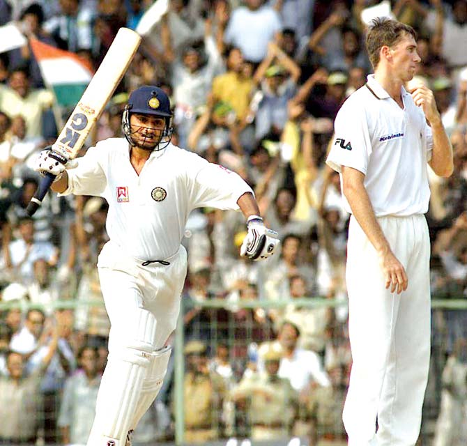 Glenn McGrath is dejected as Harbhajan Singh celebrates hitting the winning runs against Aus at Chennai in 2001. Pics/AFP, Getty Images, mid-day archives 