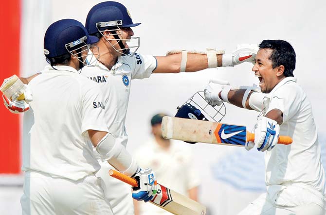 VVS Laxman (centre), Pragyan Ojha and Suresh Raina (left) celebrate India’s one-wicket win in 2010