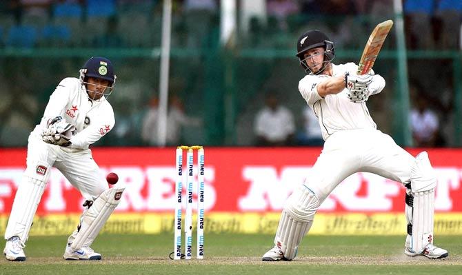 New Zealand skipper Kane Williamson plays a shot on the second day of the first Test match against India at Green Park in Kanpur. Pic/AFP