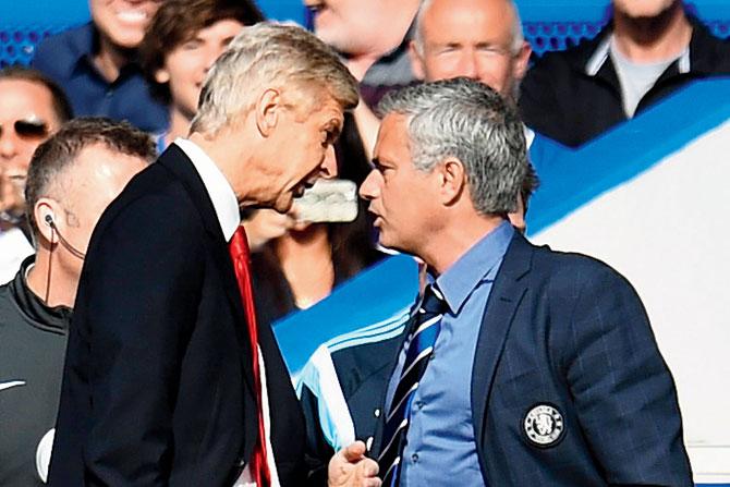 Arsenal boss Arsene Wenger (left) and Jose Mourinho clashed on several occasions when the Portuguese was at Chelsea. Pic/getty images 