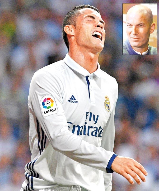 Cristiano Ronaldo expresses his disgust.Inset: Zinedine Zidane