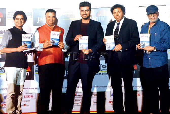 Mayank Shekhar, Vinod Shrivastav, Arjun Kapoor, Manoj Shrivastav and Ajay Brahmatmaj at launch of JFF book, Talkies — Cinema Ka Safar co-authored by Shekhar and Brahmatmaj at the festival opening ceremony