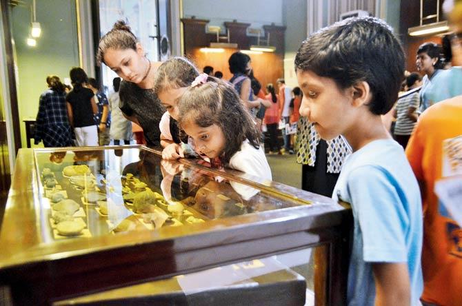 Guests check out the collection currently on display at Dr Bhau Daji Lad Mumbai City Museum in Byculla