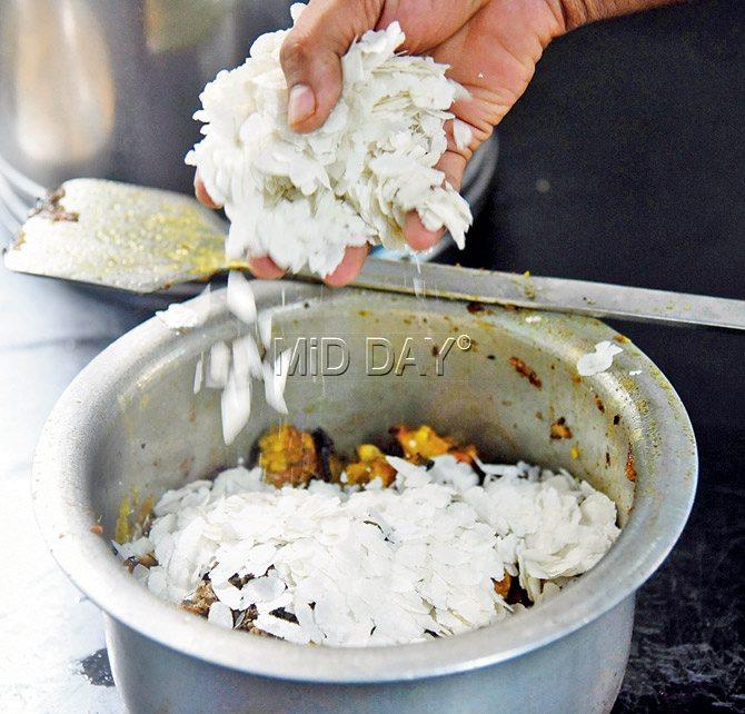 Raw nylon poha is added to the mix just before serving
