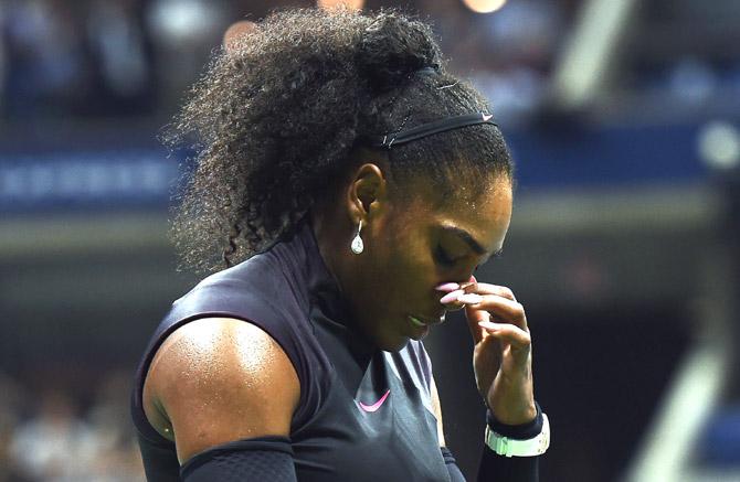 Serena Williams of the US reacts after losing a point against Karolina Pliskova of Czech Republic during their 2016 US Open Women