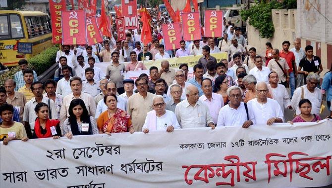 Left Front Chairman Biman Basu and other leaders holding a rally for their Sep 2 Nationwide bandh in Kolkata on Wednesday. Pic/PTI