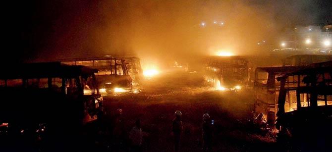 Tamil Nadu bound buses in flames after they were torched by pro-Kannada activists in Bengaluru