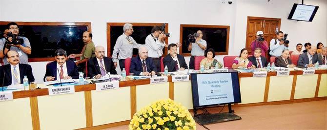 A swarm of photographers get shutter happy as CEOs of Public Sector Banks look pensive at a meeting with the Finance Minister Arun Jaitley during the FM’s Quarterly Performance Review Meeting on Friday. Pic/PTI
