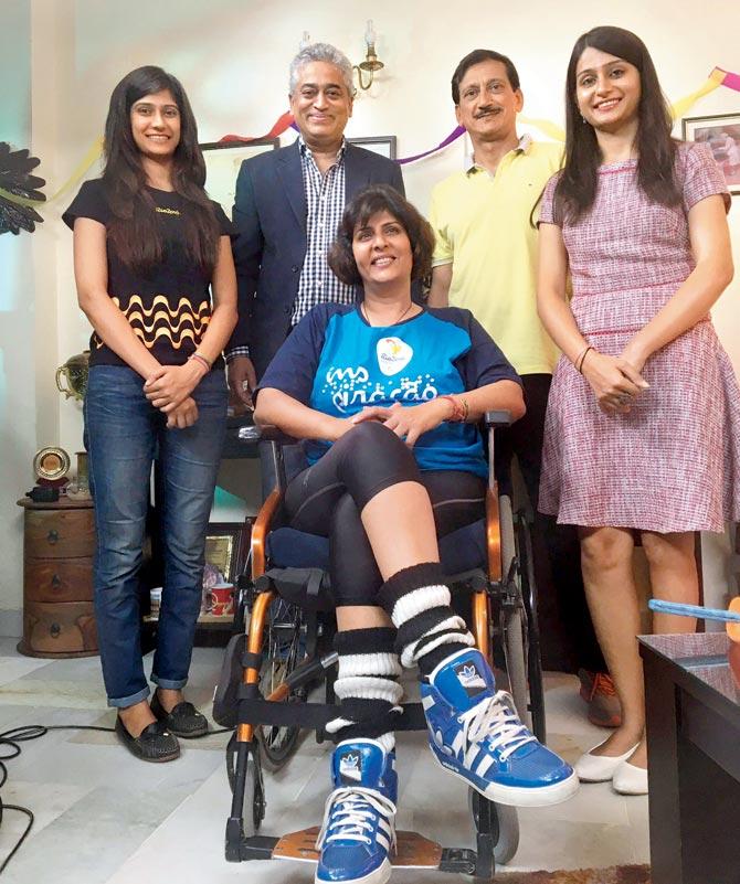 Rajdeep Sardesai with Deepa Malik and her family