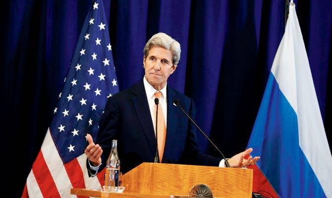 U.S. Secretary of State John Kerry gestures during a press conference to discuss the crisis in Syria, in Geneva. Pic/AP