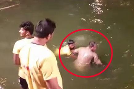 Shocking video: Thane youths try to drown cop during Ganesh visarjan
