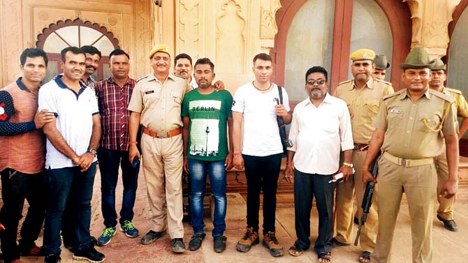 Navi Mumbai cops and the Deeg police rescued Anand Ahire (in green T-shirt) last month