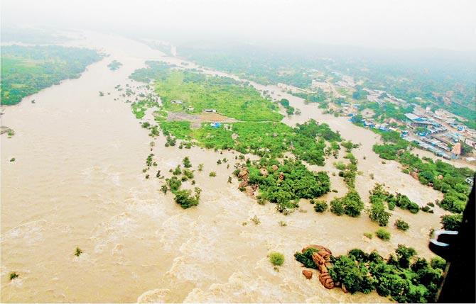 An aerial view of the flood-hit Edupalaya village in Medak district of Telangana. Pic/PTI