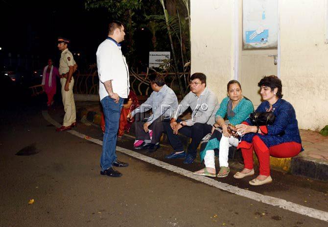 The parents outside the CM’s house yesterday. Pic/Sneha Kharabe