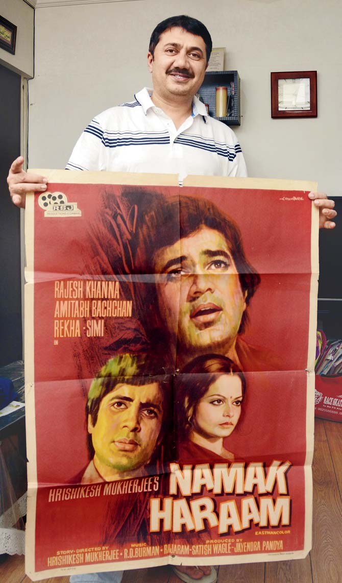 Ausaja with the first print poster of Namak Haraam, that’s part of his private collection. Pics/Sneha Kharabe